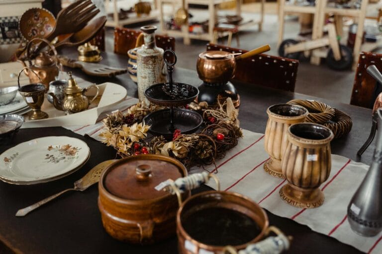 Charming collection of antique kitchenware and decor on display indoors, exuding vintage elegance.